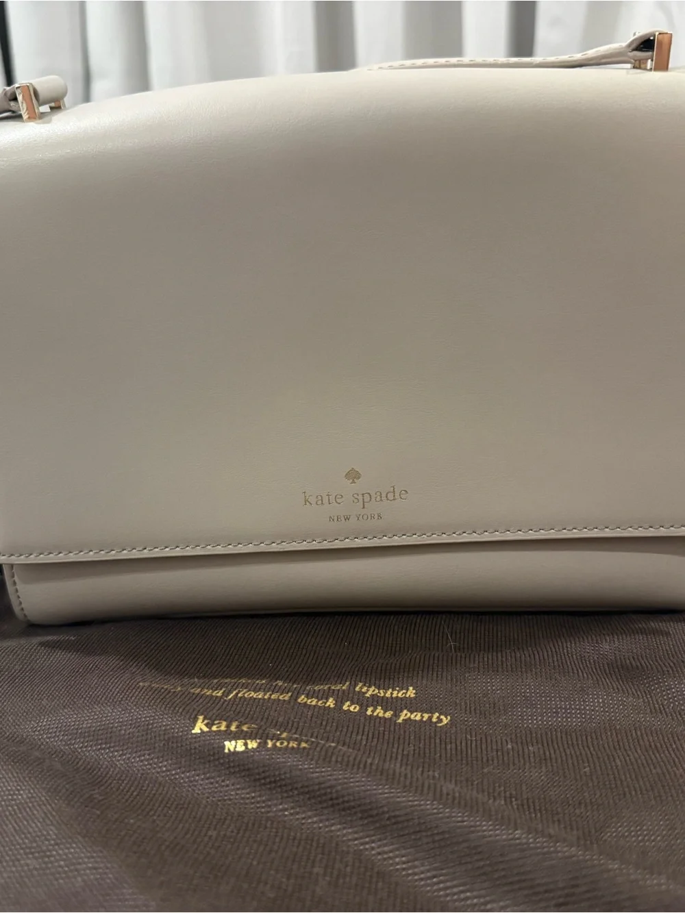 kate spade beige leather shoulder bag with gold-tone logo and dust bag